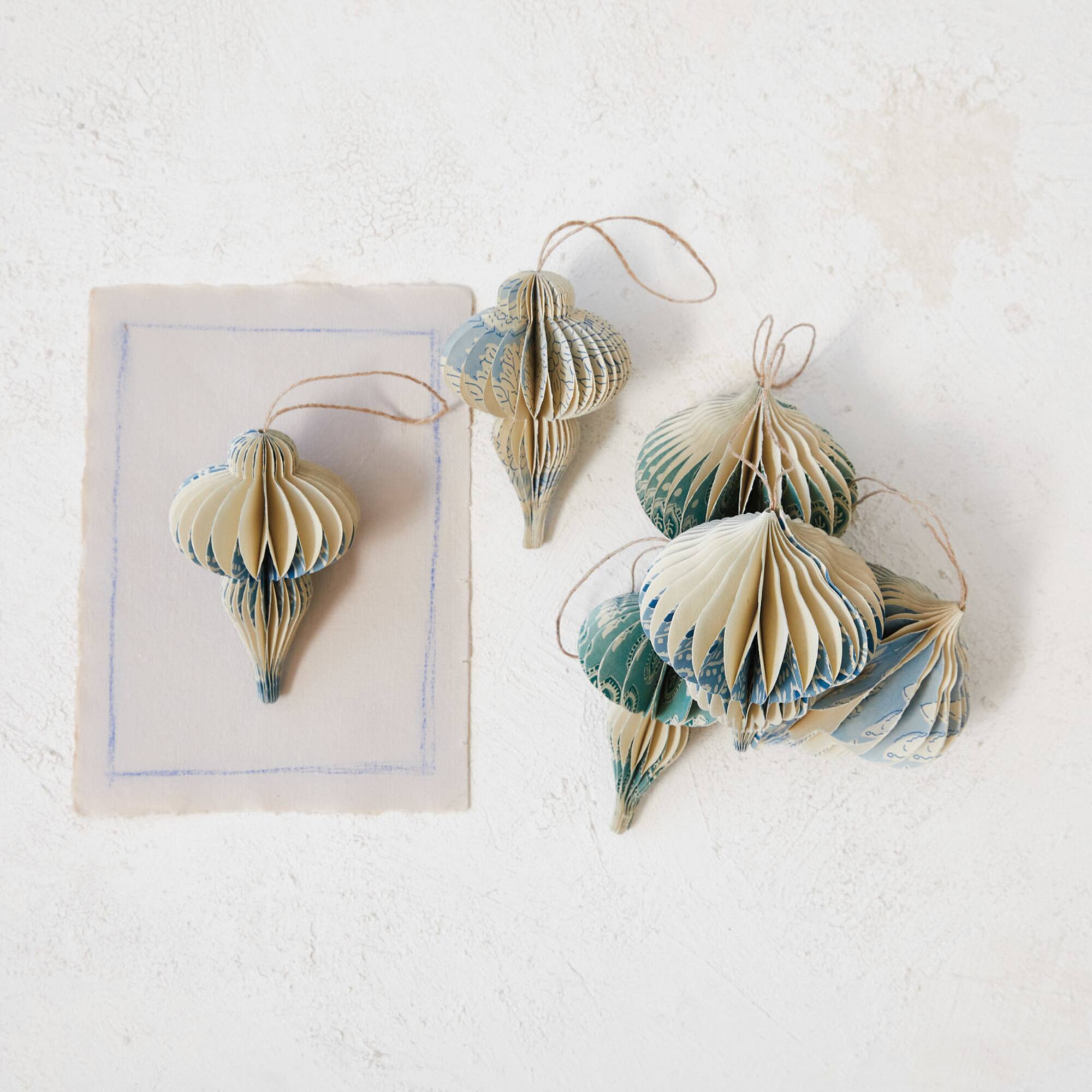 Hello Honey® 6 Pack 5" Blue & Ivory Honeycomb Finial Recycled Paper Ornaments